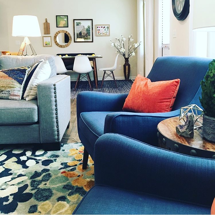 Pair of Bue Chairs, Orange Pillow Cate Holcombe Interiors, Raleigh NC