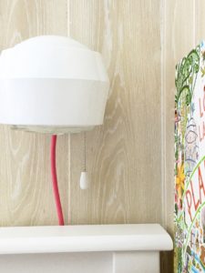 Beachy bunk room with plug-in sconces