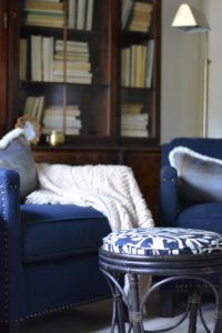 rattan footstool, library, navy chairs, Cate Holcombe Interiors