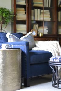 gold table, navy chair, library, Cate Holcombe Interiors
