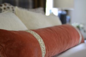 rust velvet long lumbar pillow, Kravet Toboggan Blue Jay, plaid headboard, Cate Holcombe Interiors